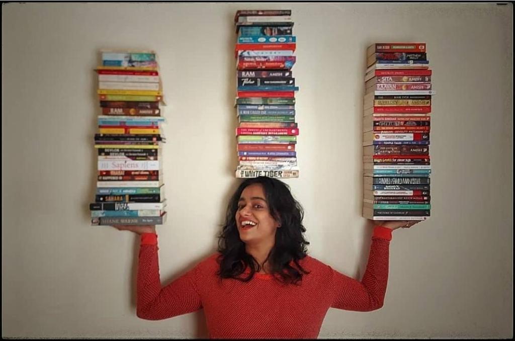 Radio City 91.1 RJ Sowjanya posing with books, Story by The Winged Women